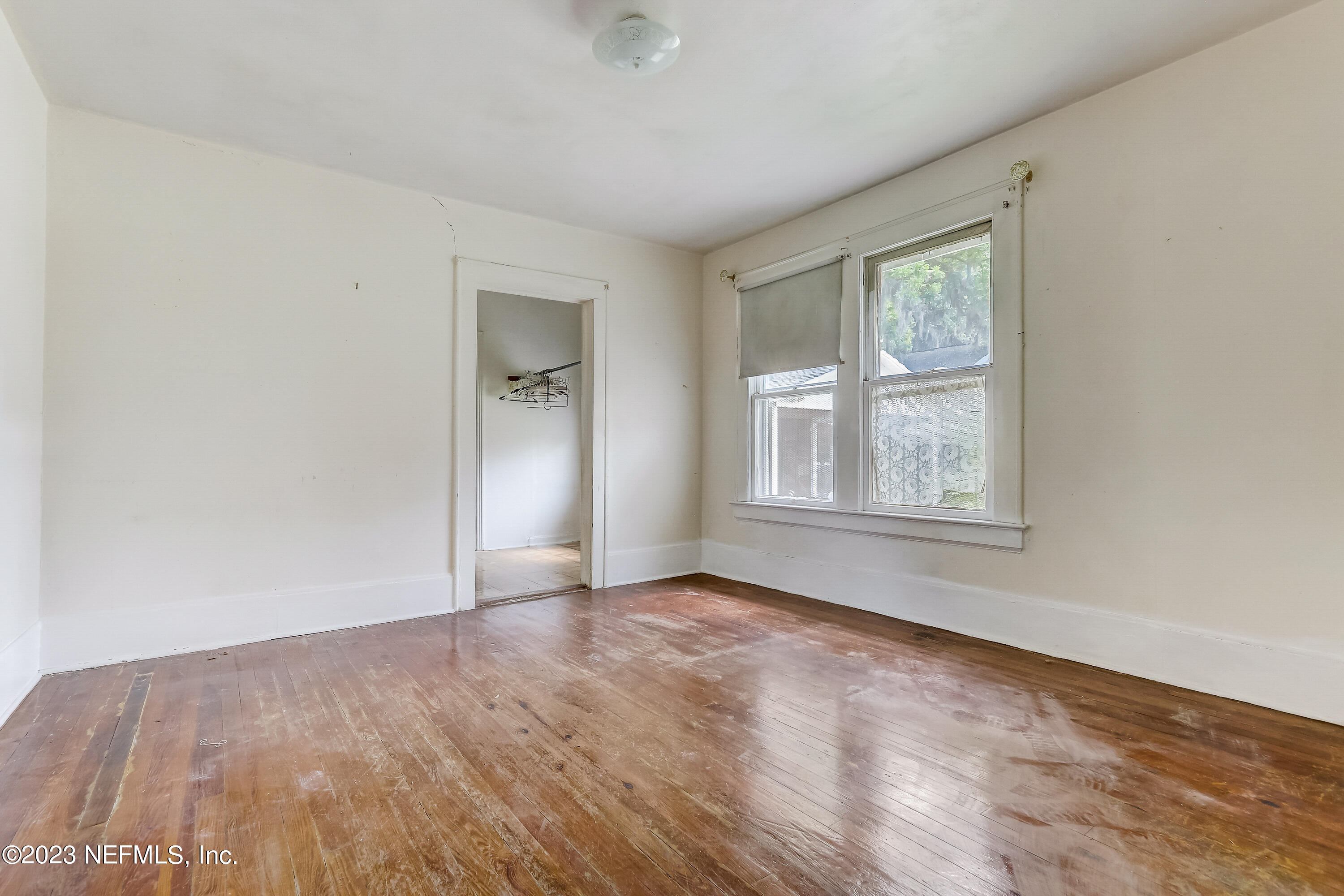 3547 Capper Road Jacksonville, FL 32218 - Photo 12 of 24 an empty room with windows and closet