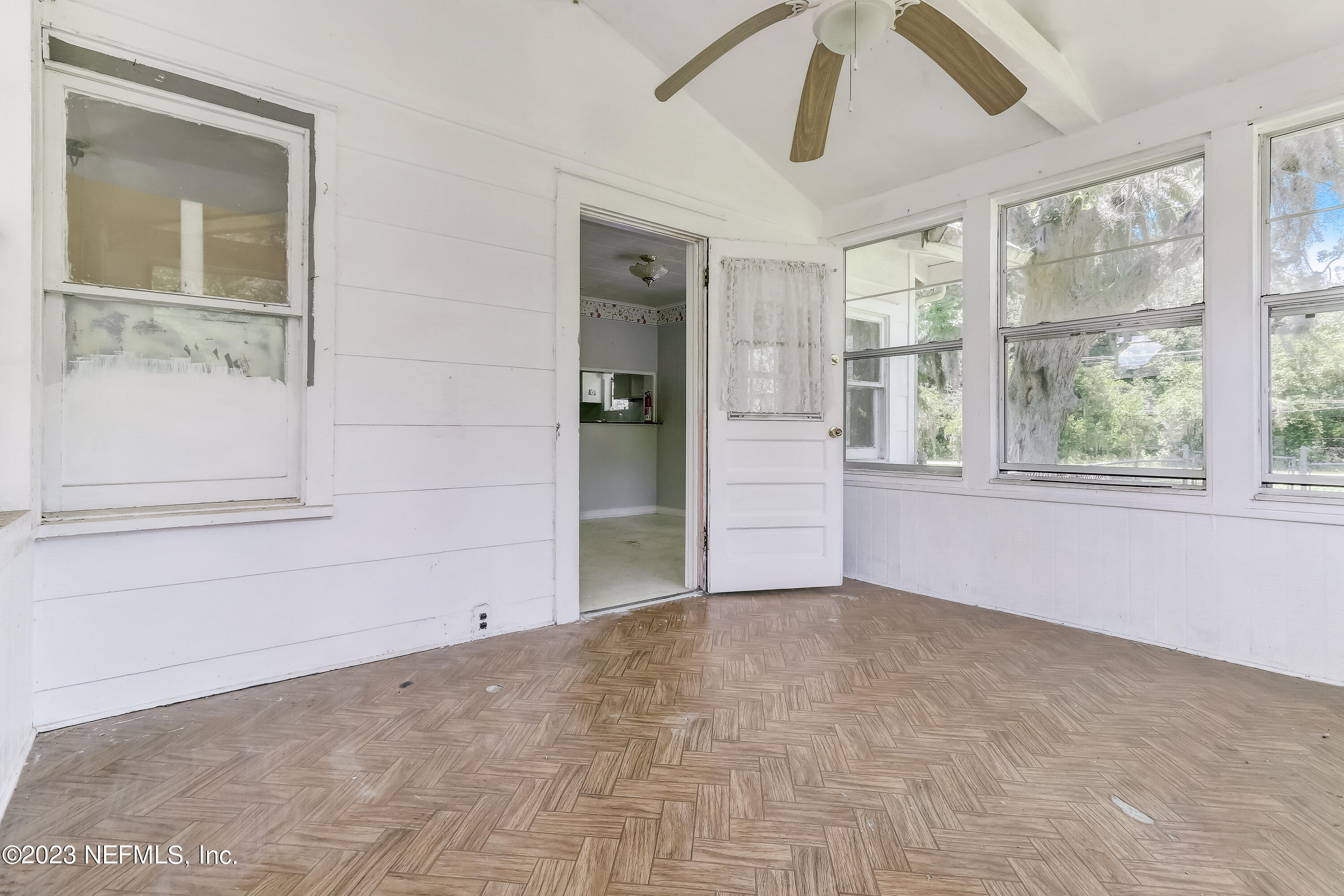 3547 Capper Road Jacksonville, FL 32218 - Photo 17 of 24 a view of an empty room with a window