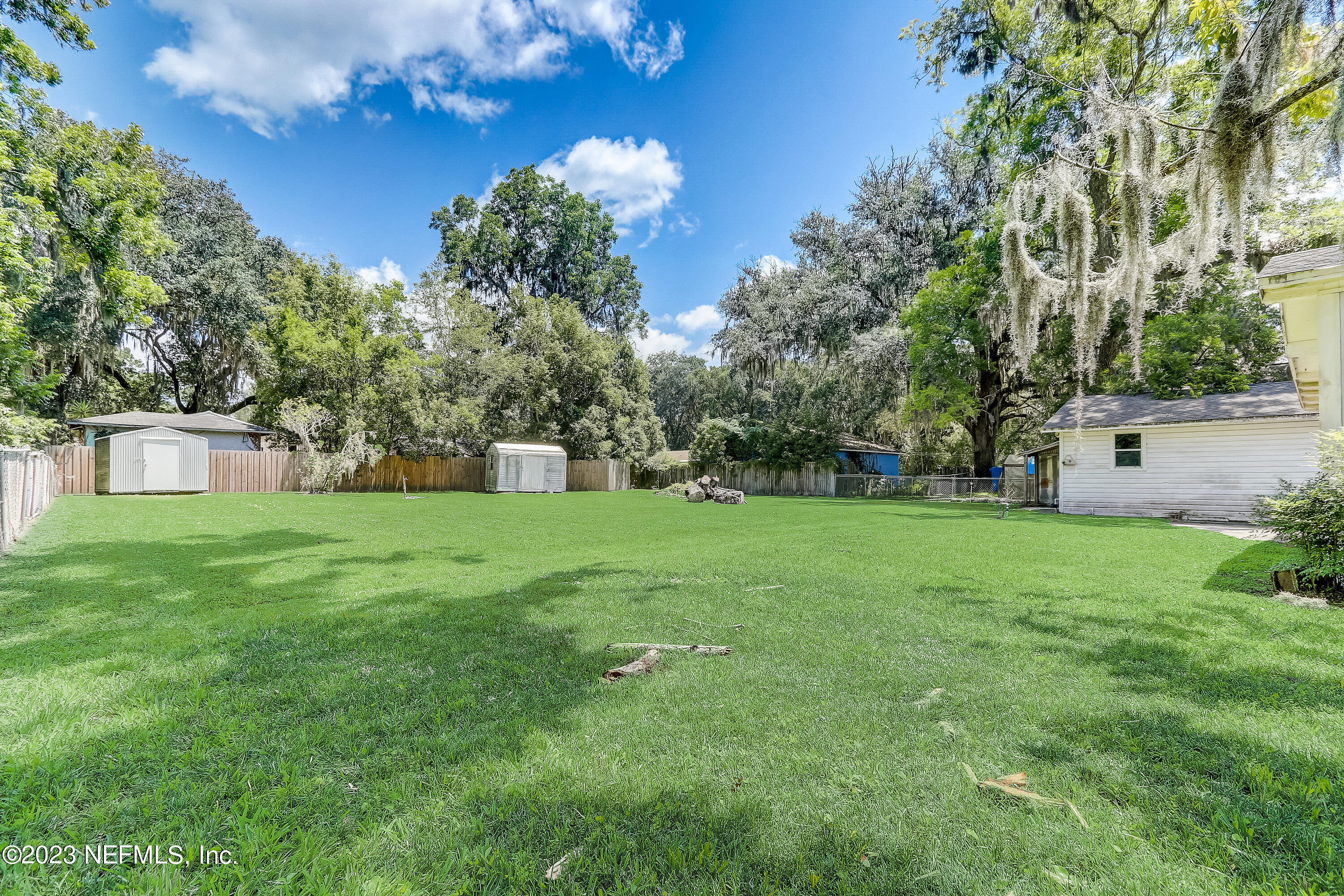 3547 Capper Road Jacksonville, FL 32218 - Photo 22 of 24 a view of a house with a yard
