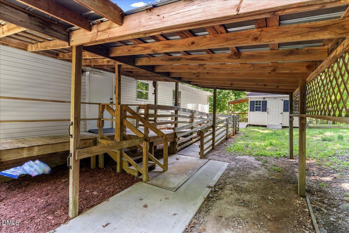 1111 Stoney Mountain Road Rougemont, NC 27572 - Photo 21 of 30 a view of a porch with furniture