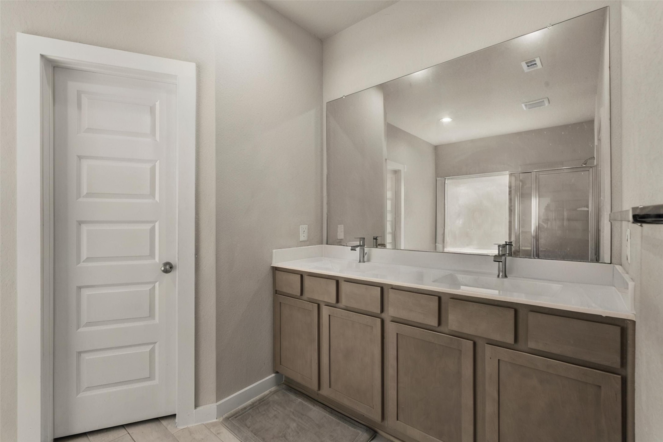 22939 Aspen Vista Dr Spring Spring, TX 77373 - Photo 11 of 29 The spacious primary bath features an extended dual sink vanity, abundant storage, and a thoughtfully designed layout that makes busy mornings effortless.