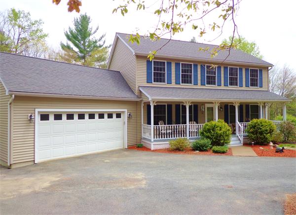43 Old Poor Farm Road Ware, MA 01082 - Photo 26 of 29 a front view of a house with a yard and garage