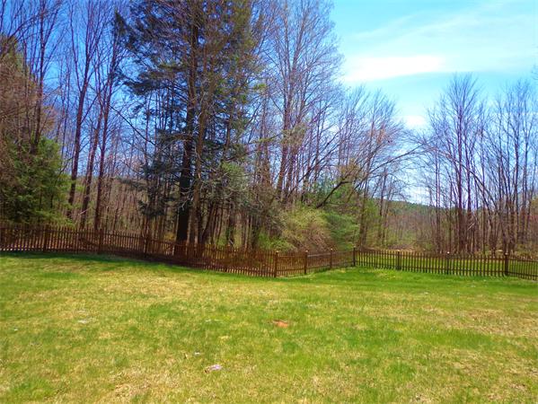43 Old Poor Farm Road Ware, MA 01082 - Photo 27 of 29 a backyard of a house with lots of green space
