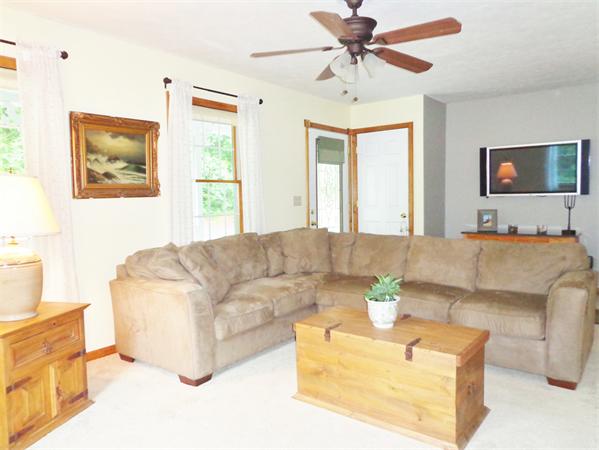 43 Old Poor Farm Road Ware, MA 01082 - Photo 5 of 29 a living room with couches a coffee table and a lamp with potted plant