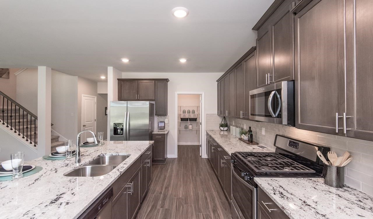 Photo is not of the actual home, but is an inspirational photo of builder’s model home.