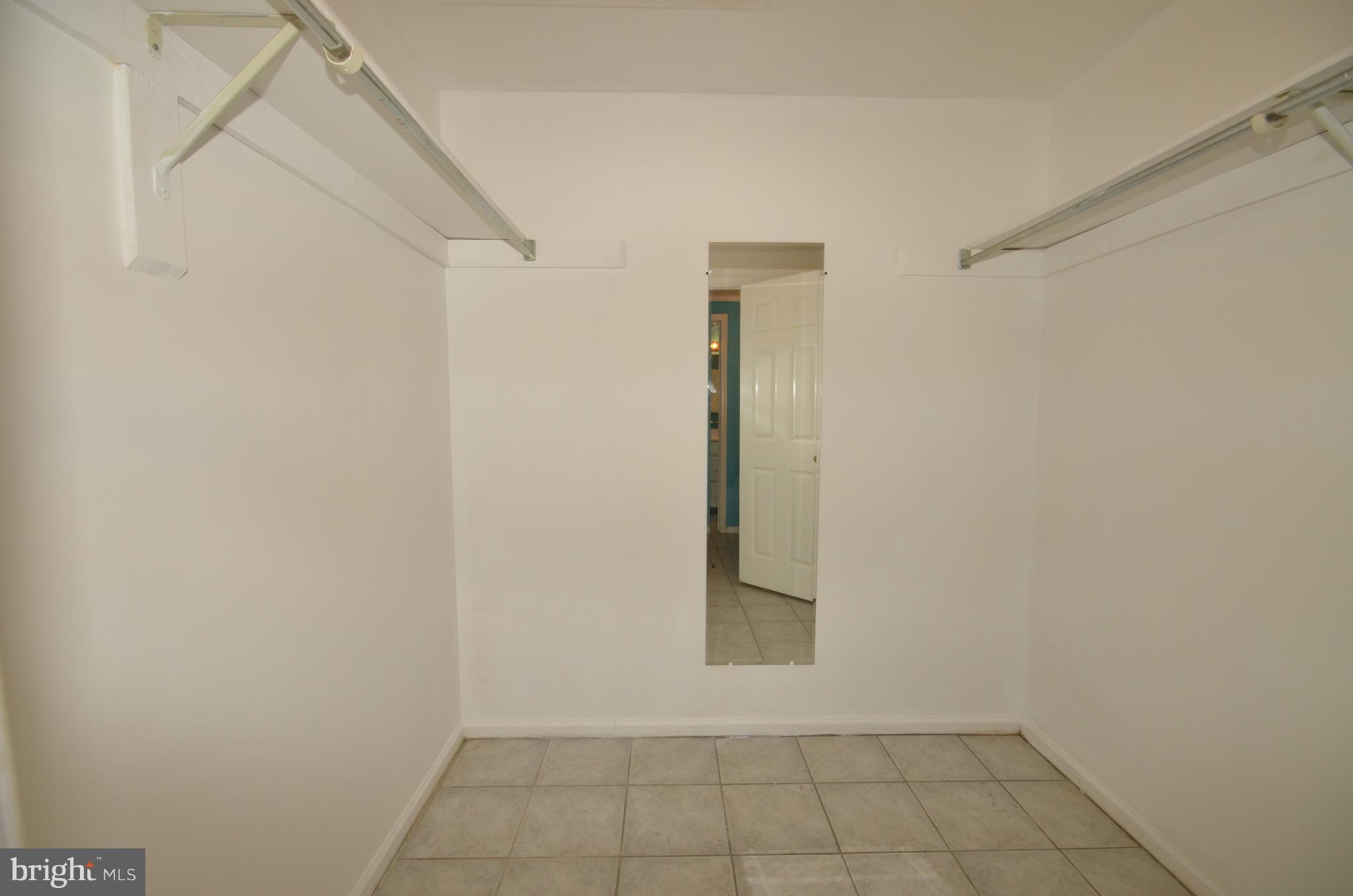 122 Peyton Road Sterling, VA 20165 - Photo 13 of 25 Walk-in closet in master bedroom