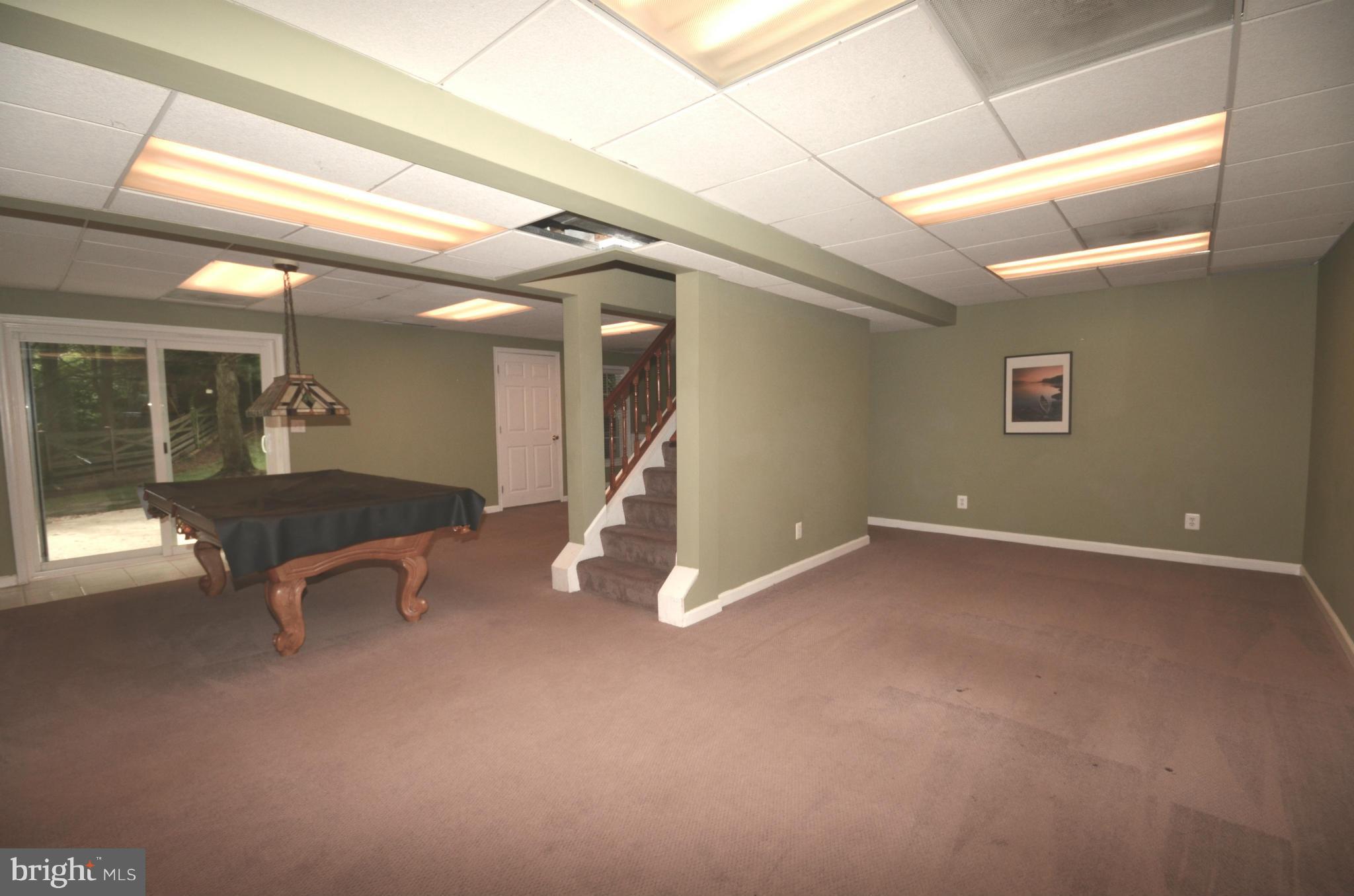 122 Peyton Road Sterling, VA 20165 - Photo 17 of 25 Large finished rec-room with walkout to patio