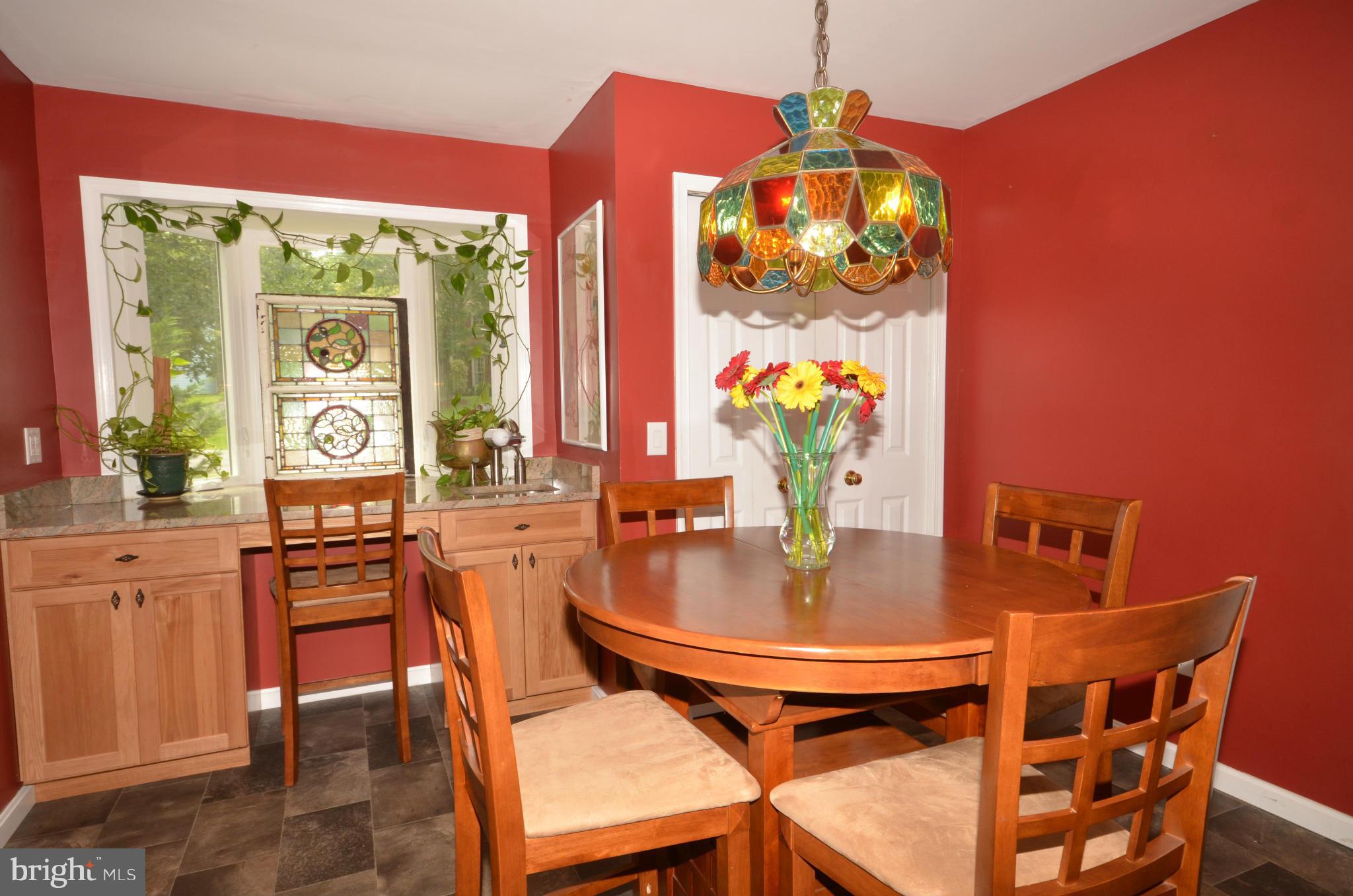 122 Peyton Road Sterling, VA 20165 - Photo 5 of 25 Kitchen includes eat-in table area