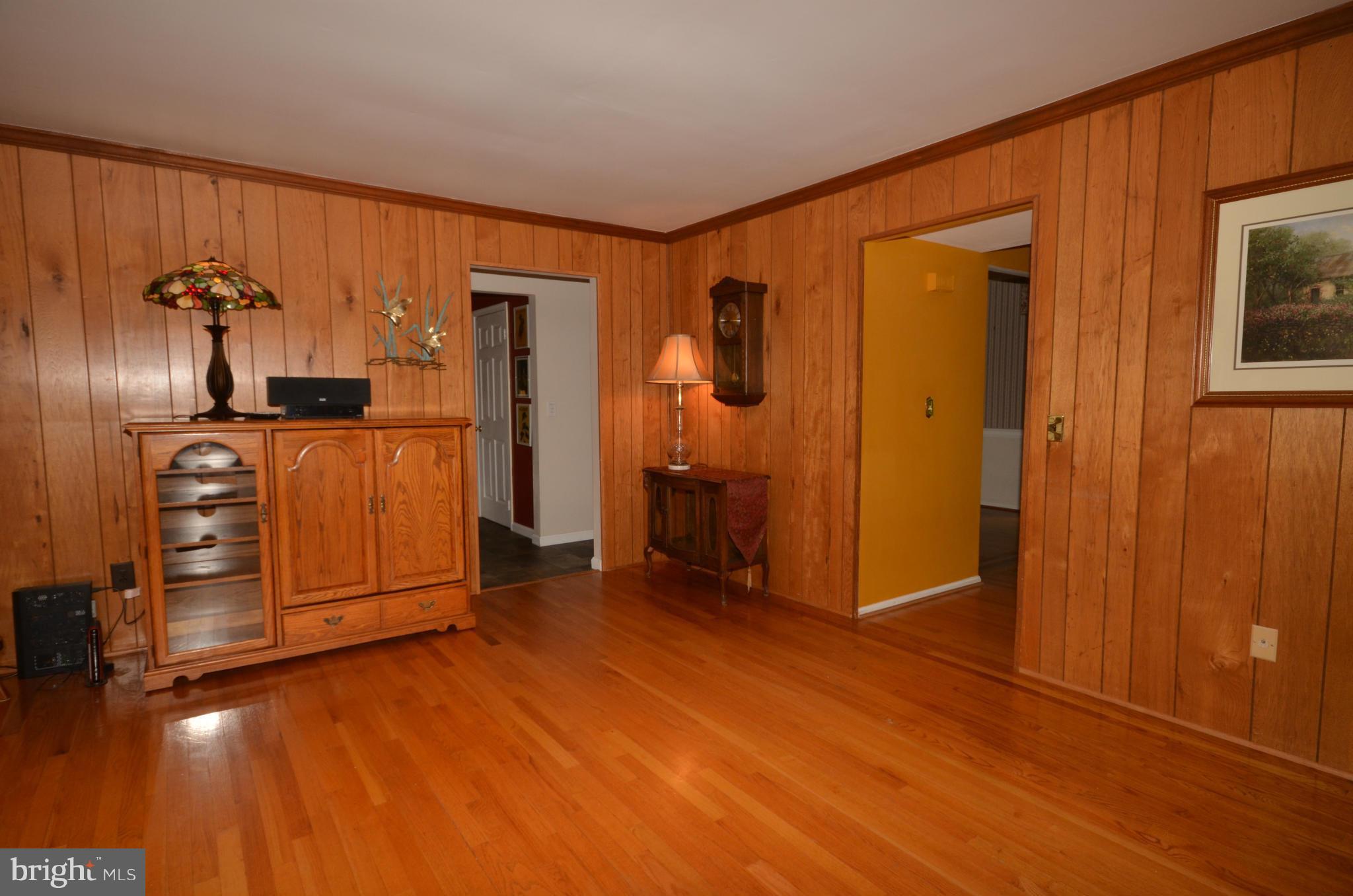 122 Peyton Road Sterling, VA 20165 - Photo 10 of 25 Family Room with hardwood floors opens to kitchen