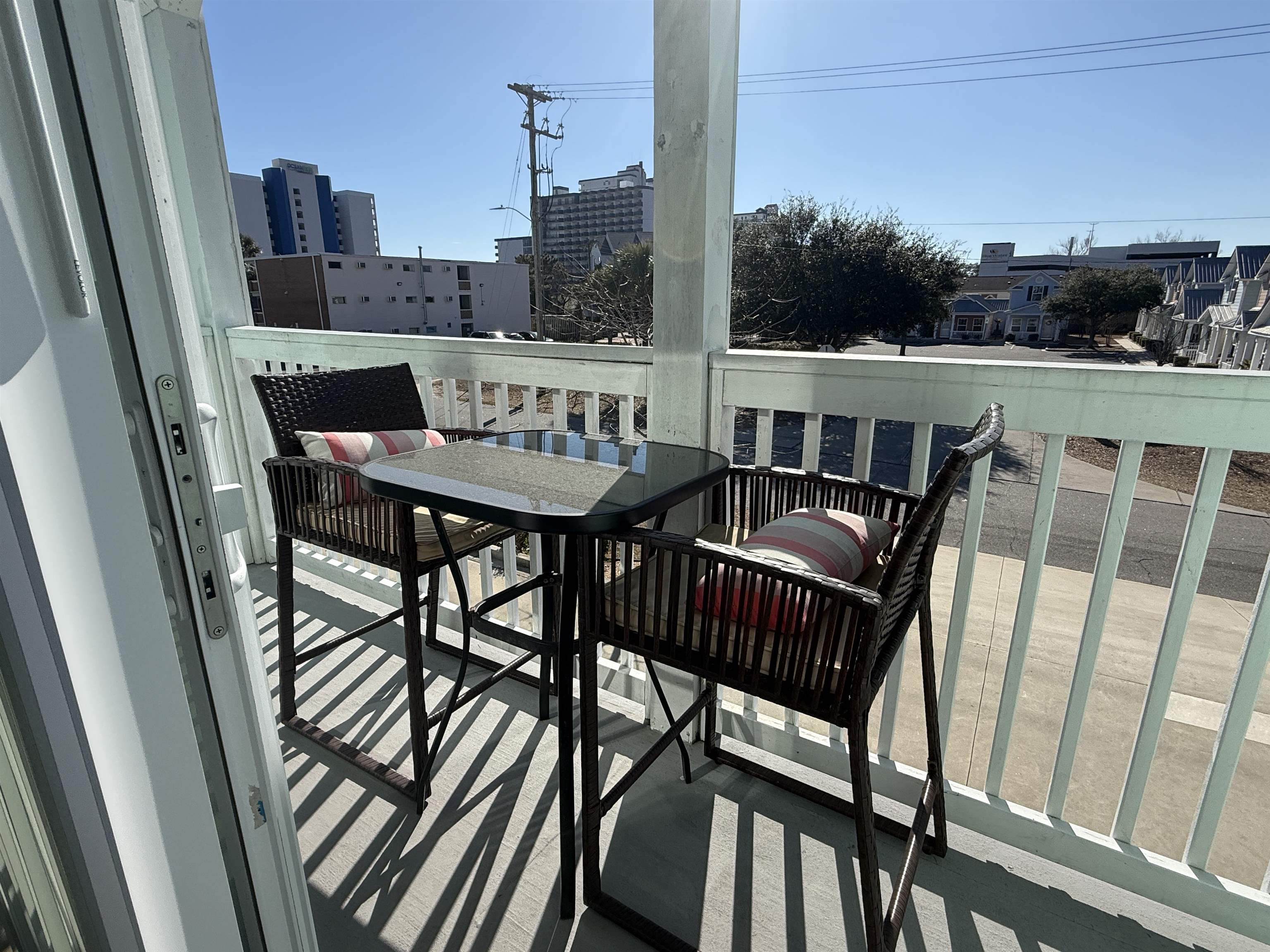 270 19th Avenue South, Unit B Myrtle Beach, SC 29577 - Photo 12 of 21 Balcony off of living room. There is another off of primary bedroom upstairs.