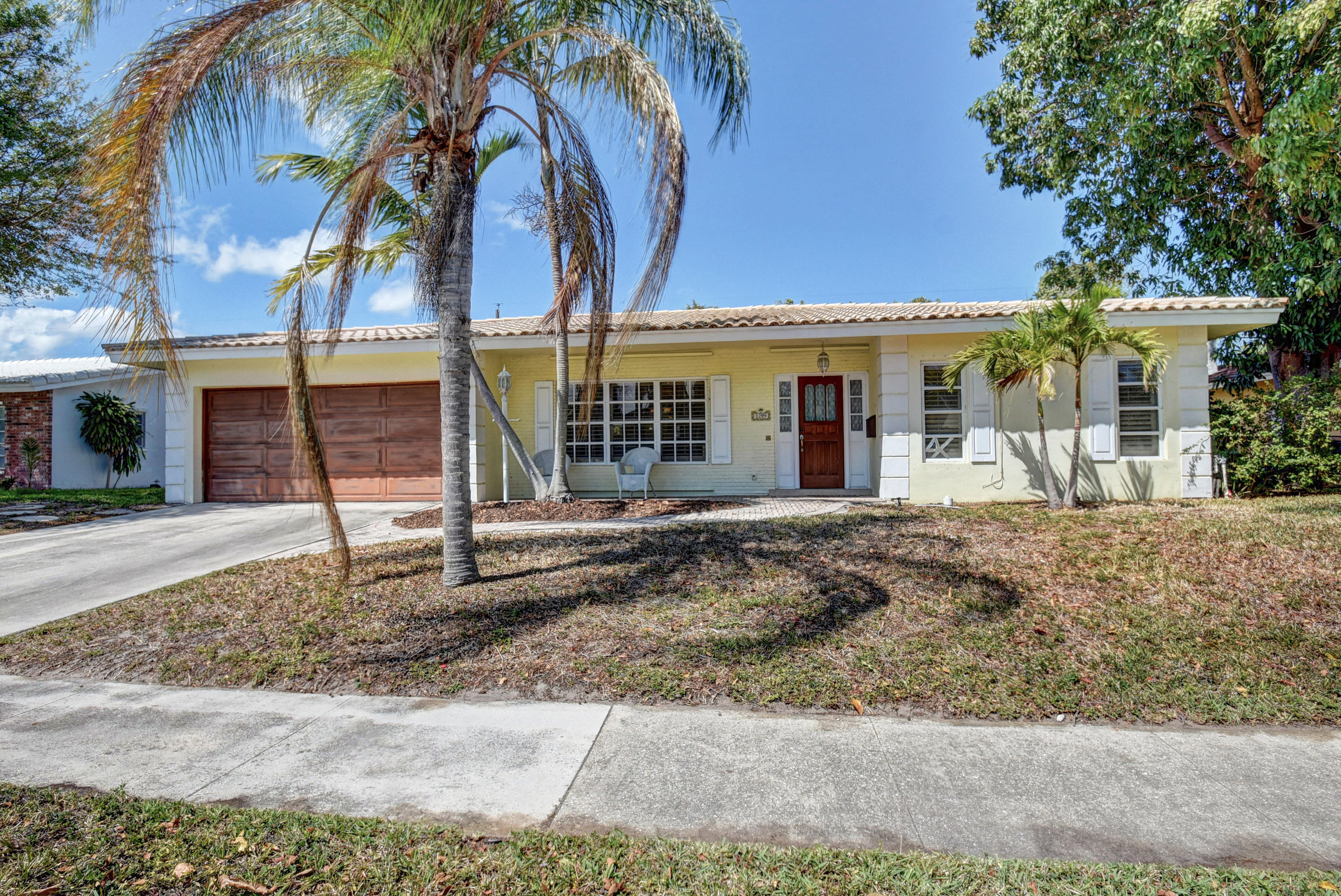 1299 Southwest 8th Street Boca Raton, FL 33486 - Photo 1 of 40 front