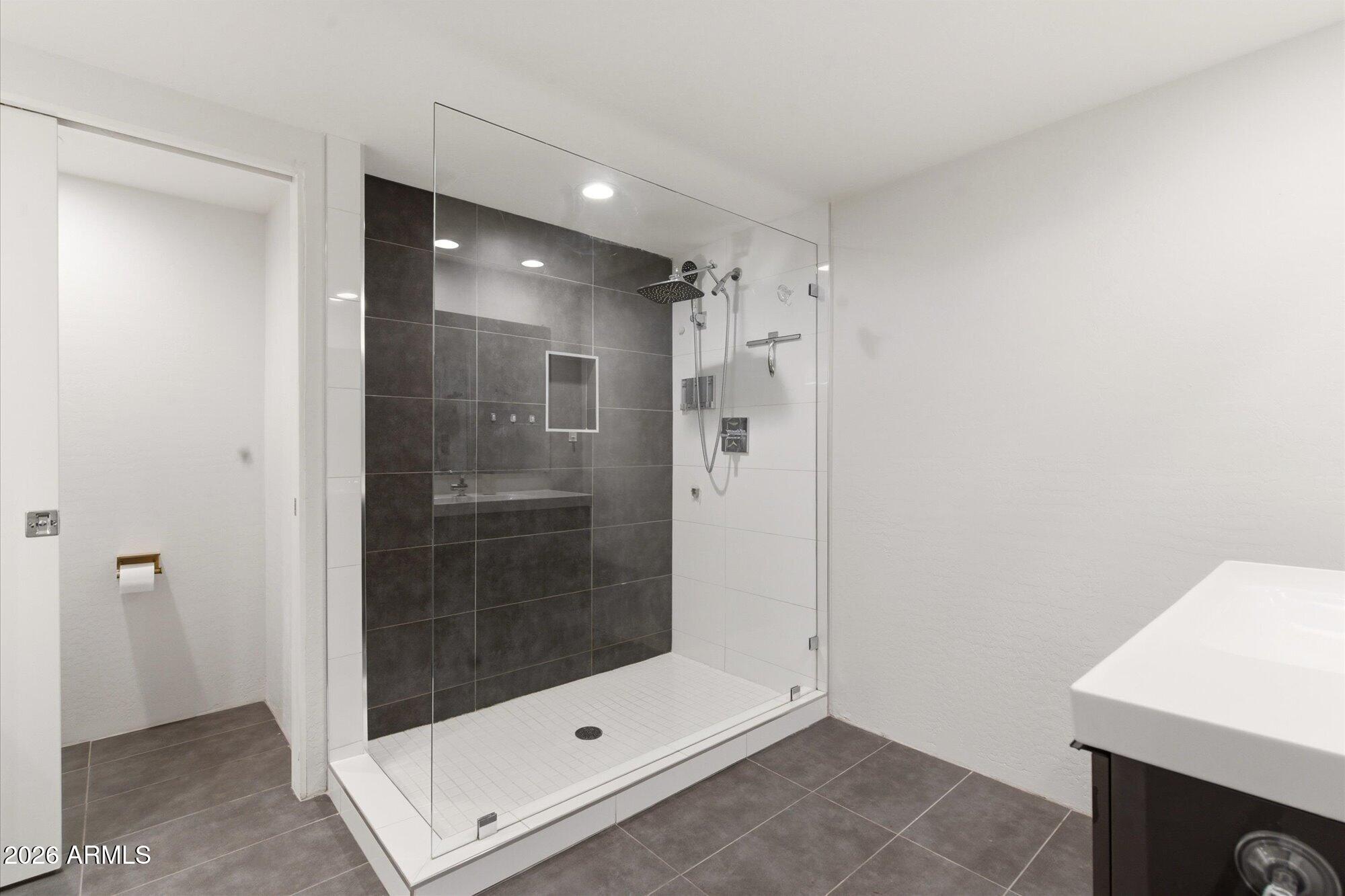 3020 East Wethersfield Road Phoenix, AZ 85032 - Photo 21 of 46 a bathroom with a shower