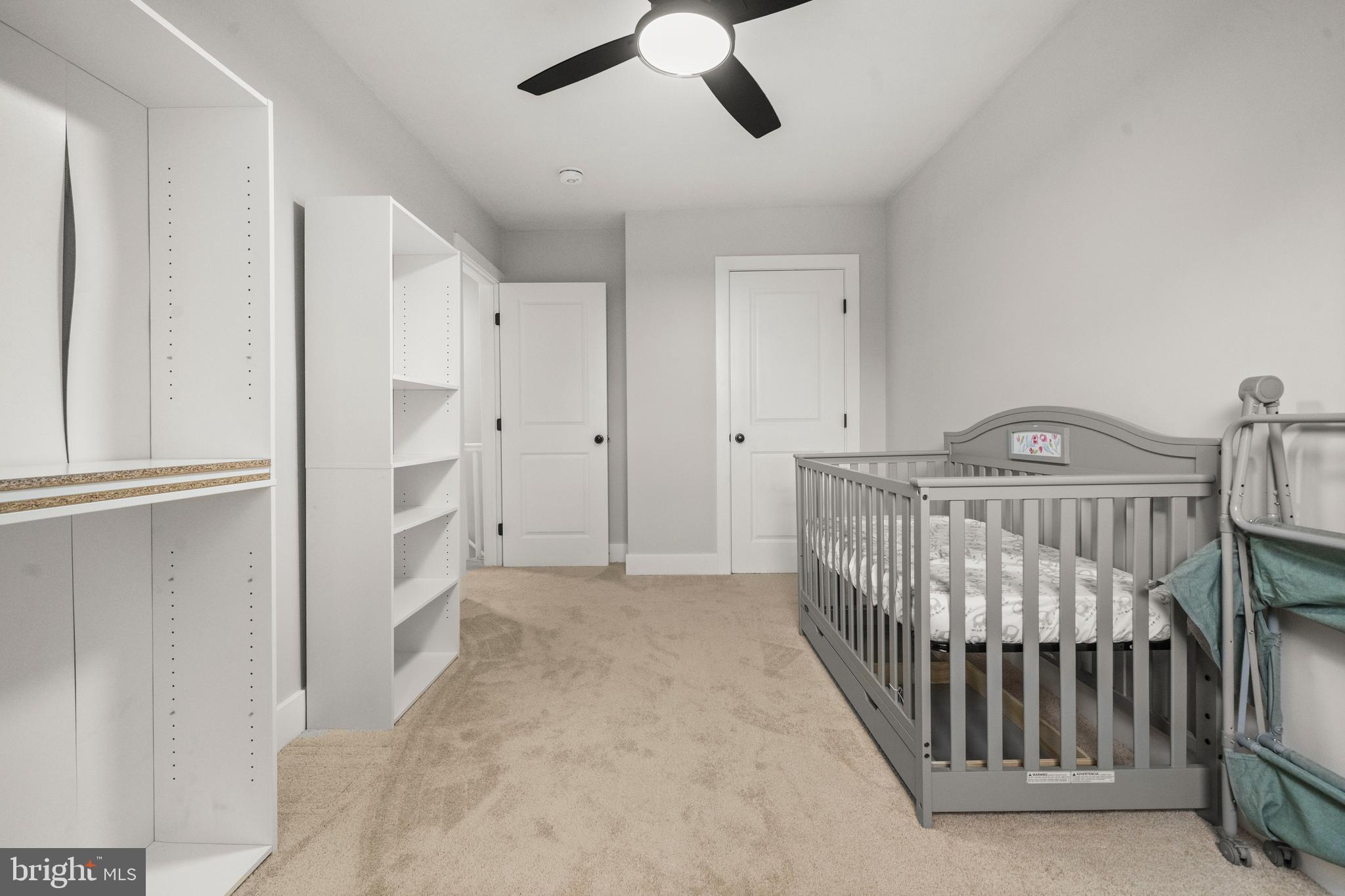 3707 Dunlap Street Temple Hills, MD 20748 - Photo 14 of 30 a view of hallway with chandelier fan