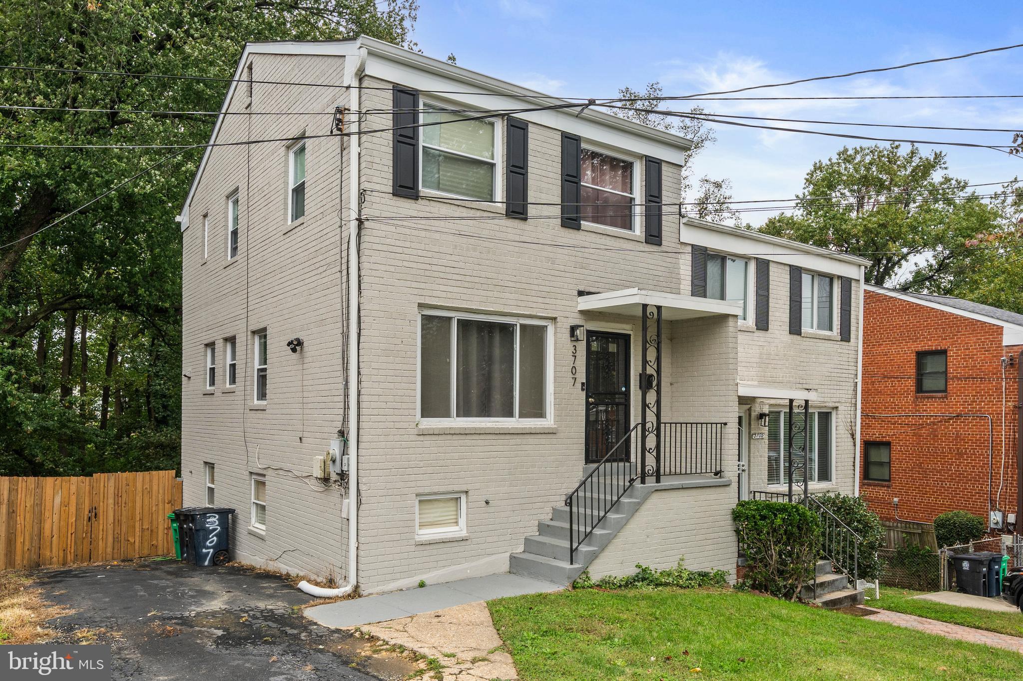 3707 Dunlap Street Temple Hills, MD 20748 - Photo 26 of 30 a front view of a house with garden