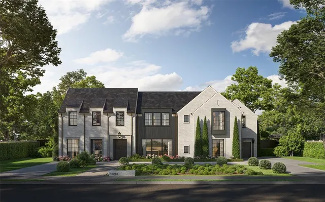 a front view of a building with garden