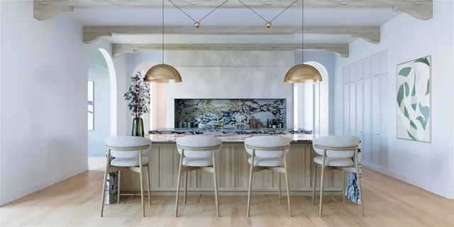 a dining room with a table and chairs