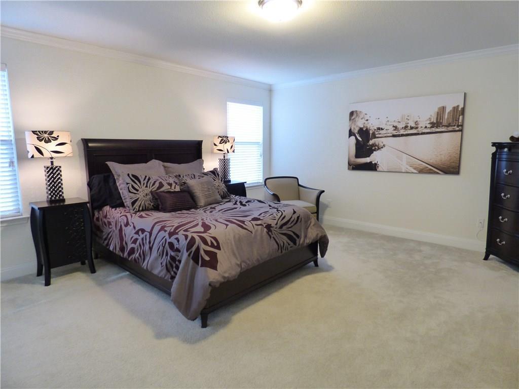 1216 Yellow Iris Road Leander, TX 78641 - Photo 21 of 33 a bedroom with bed and window