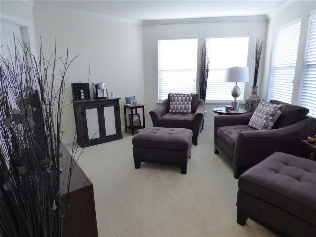 1216 Yellow Iris Road Leander, TX 78641 - Photo 23 of 33 a living room with furniture and a large window