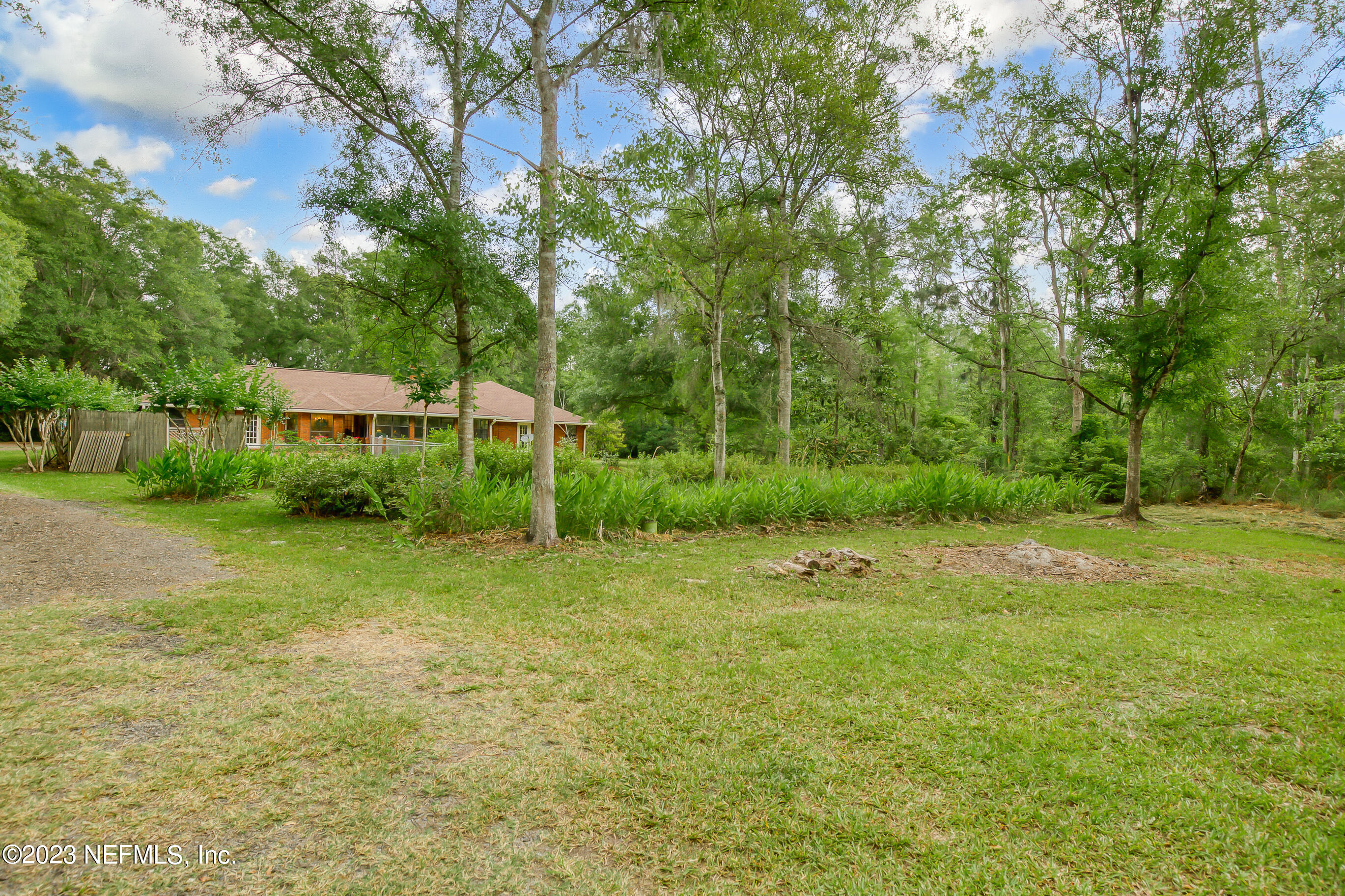 541777 Lem Turner Road Callahan, FL 32011 - Photo 31 of 32 Rear backyard view