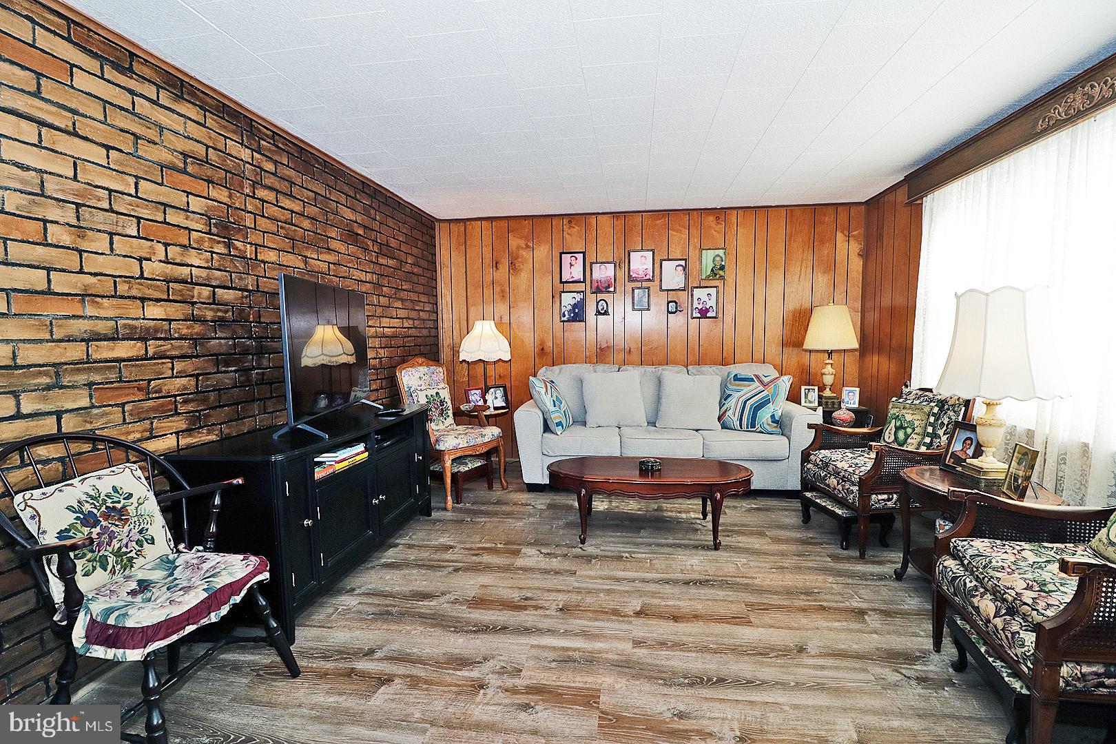 16 Partridge Place Whiting, NJ 08759 - Photo 9 of 29 a living room with furniture and a fireplace