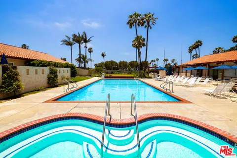 a view of a swimming pool with an outdoor space