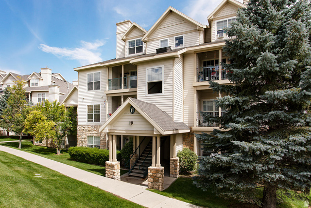 900 Bitner Road, Unit H35 Park City, UT 84098 - Photo 1 of 14 Charming two-story colonial with cream-colored vinyl siding and multiple gabled rooflines