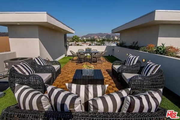 a view of a backyard of the house