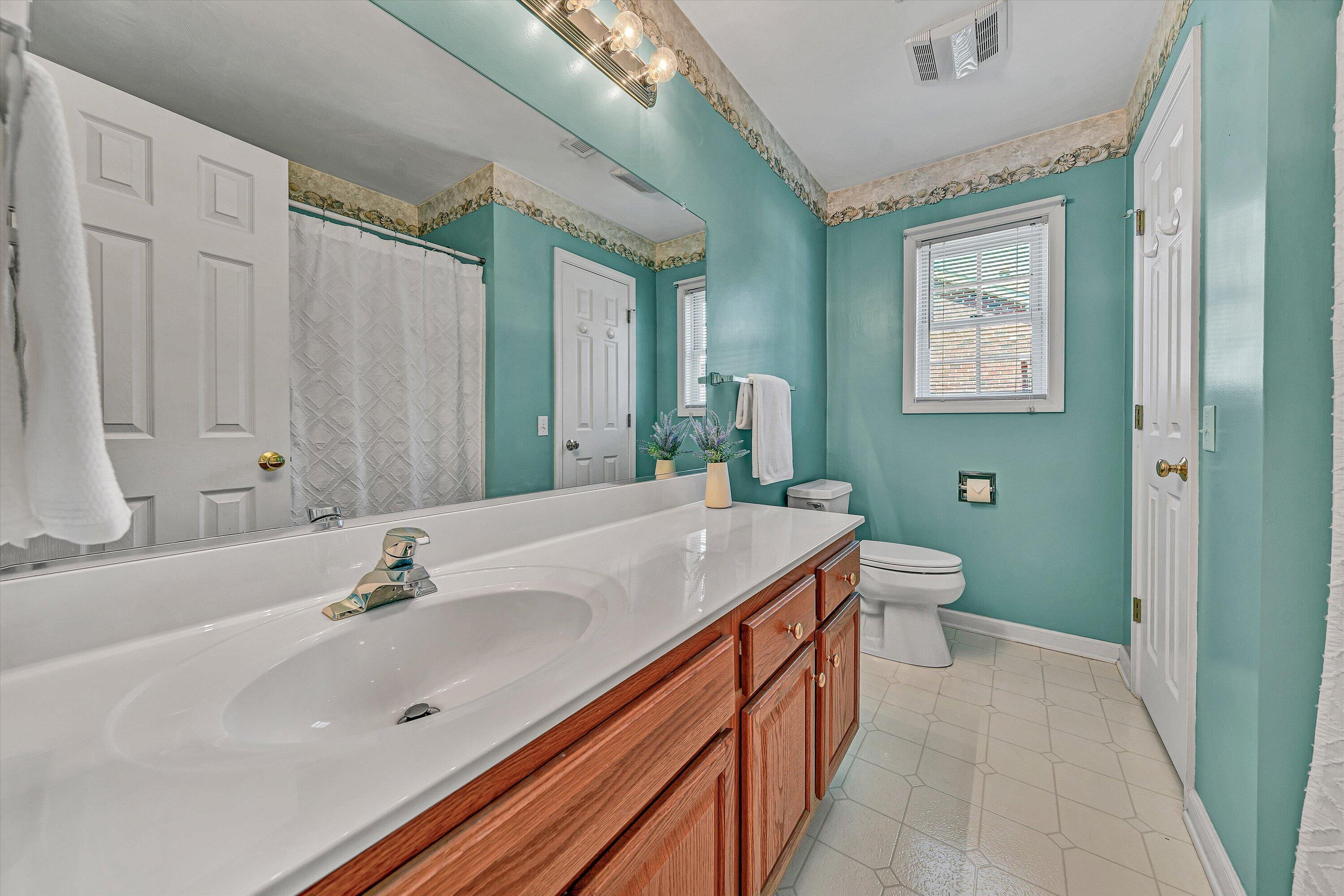 3516 Pinnacle Ridge Road Northeast Roanoke, VA 24012 - Photo 27 of 39 a bathroom with a sink and a mirror