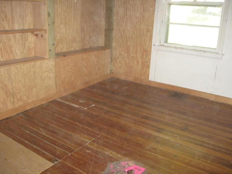 3755 Bandy Road Roanoke, VA 24014 - Photo 3 of 5 an empty room with wooden floor and windows