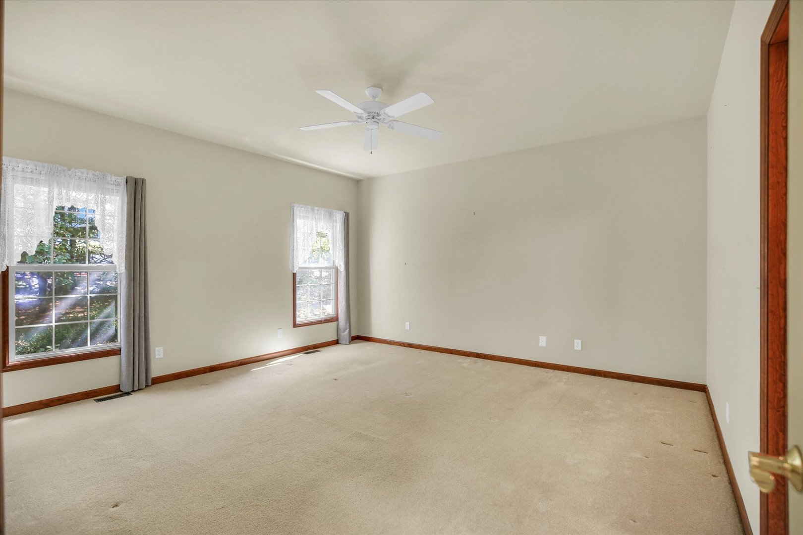 2424 Prairie Ridge Place Champaign, IL 61822 - Photo 15 of 48 an empty room with windows