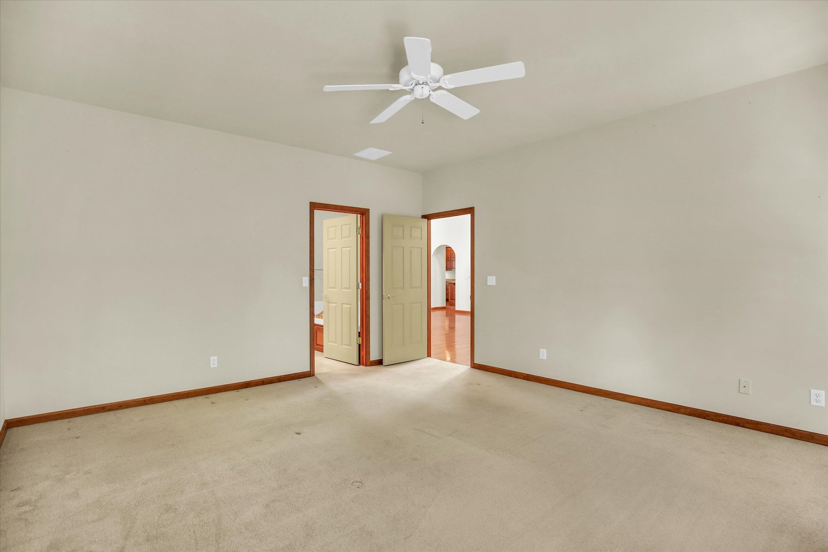 2424 Prairie Ridge Place Champaign, IL 61822 - Photo 16 of 48 an empty room with a ceiling fan and a window