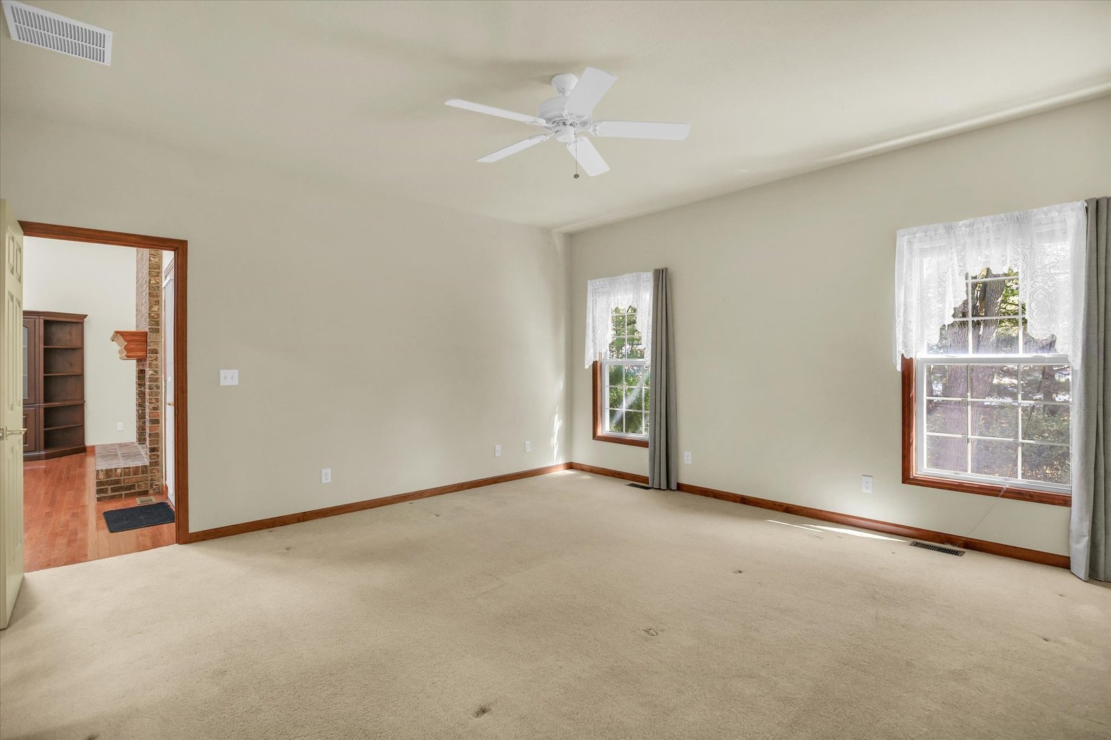 2424 Prairie Ridge Place Champaign, IL 61822 - Photo 17 of 48 an empty room with windows and closet