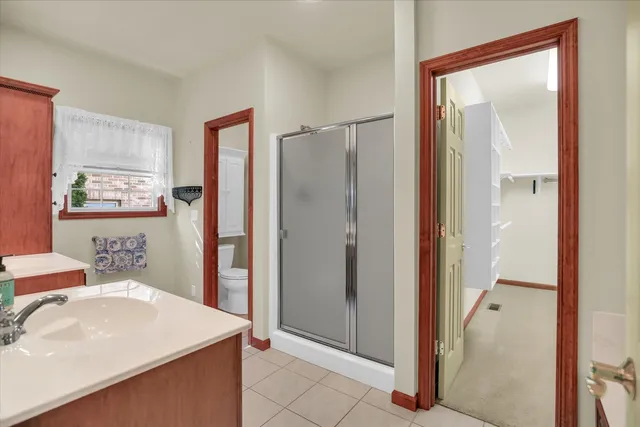 a view of a bathroom from the hallway