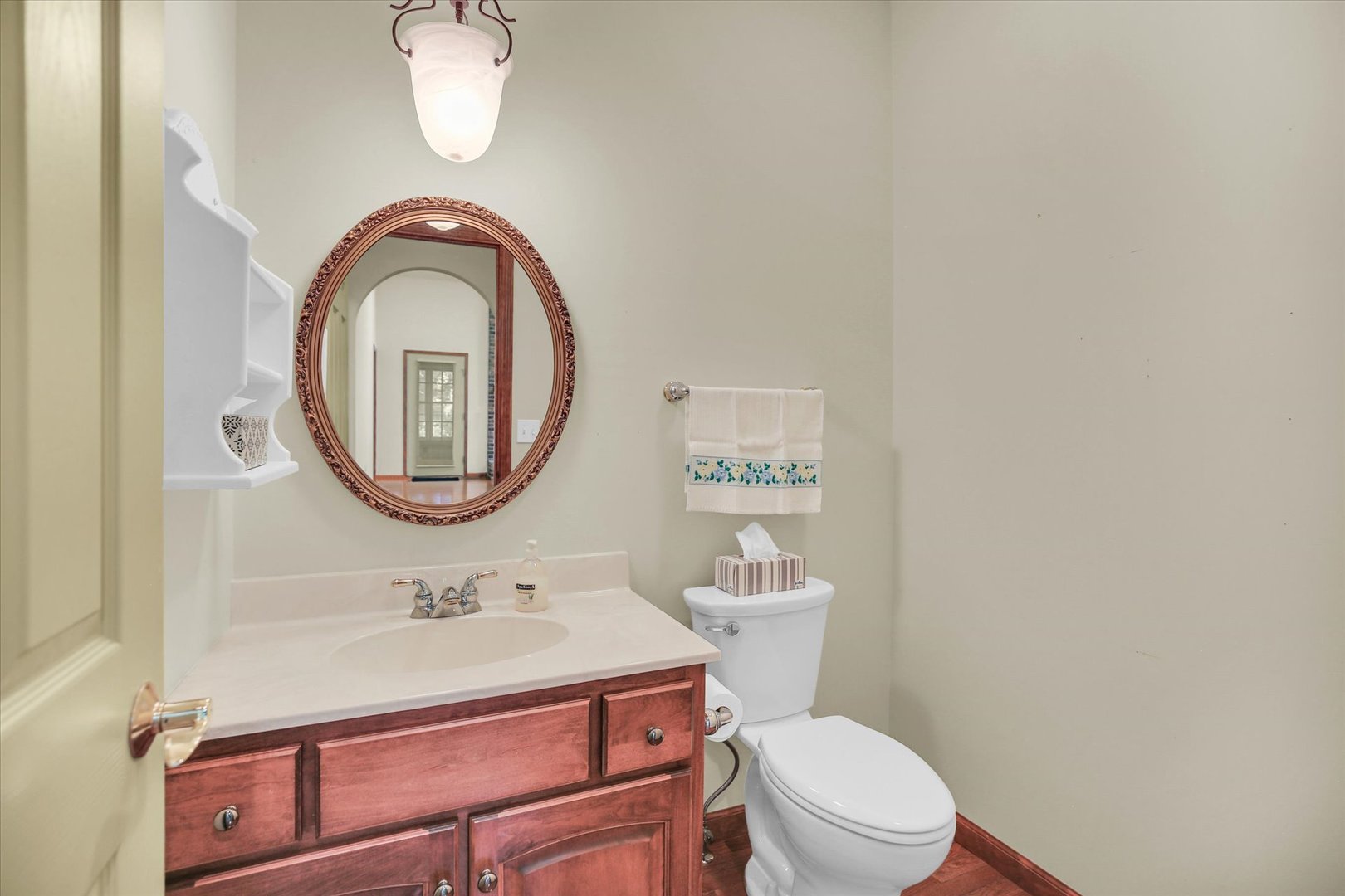 2424 Prairie Ridge Place Champaign, IL 61822 - Photo 29 of 48 a bathroom with a sink a mirror a toilet and a sink