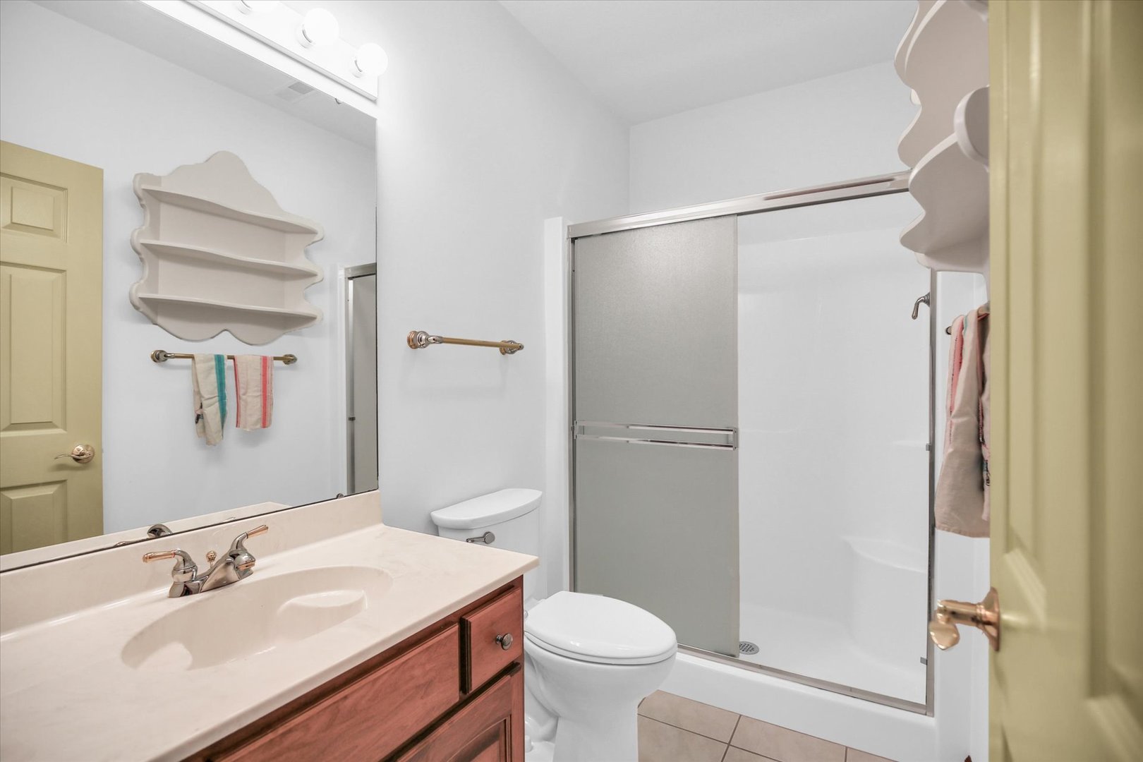 2424 Prairie Ridge Place Champaign, IL 61822 - Photo 31 of 48 a bathroom with a sink toilet and shower