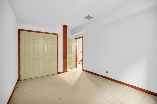 a view of a room with windows