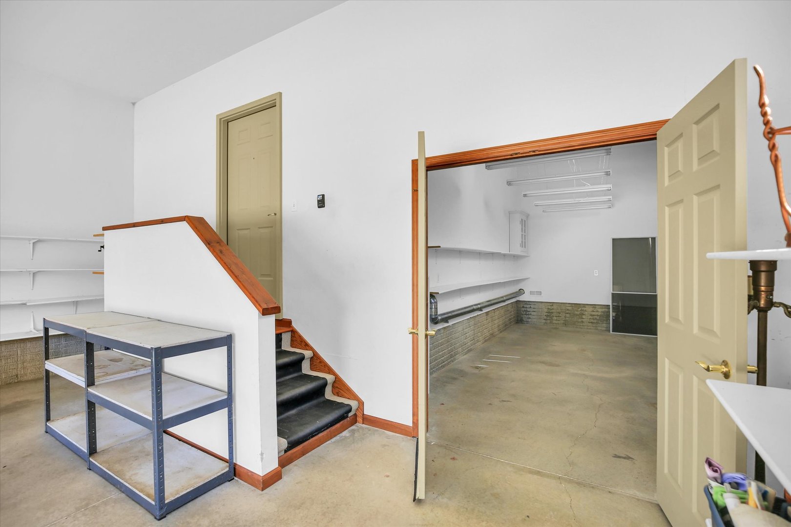 2424 Prairie Ridge Place Champaign, IL 61822 - Photo 40 of 48 a view of staircase with white walls and window