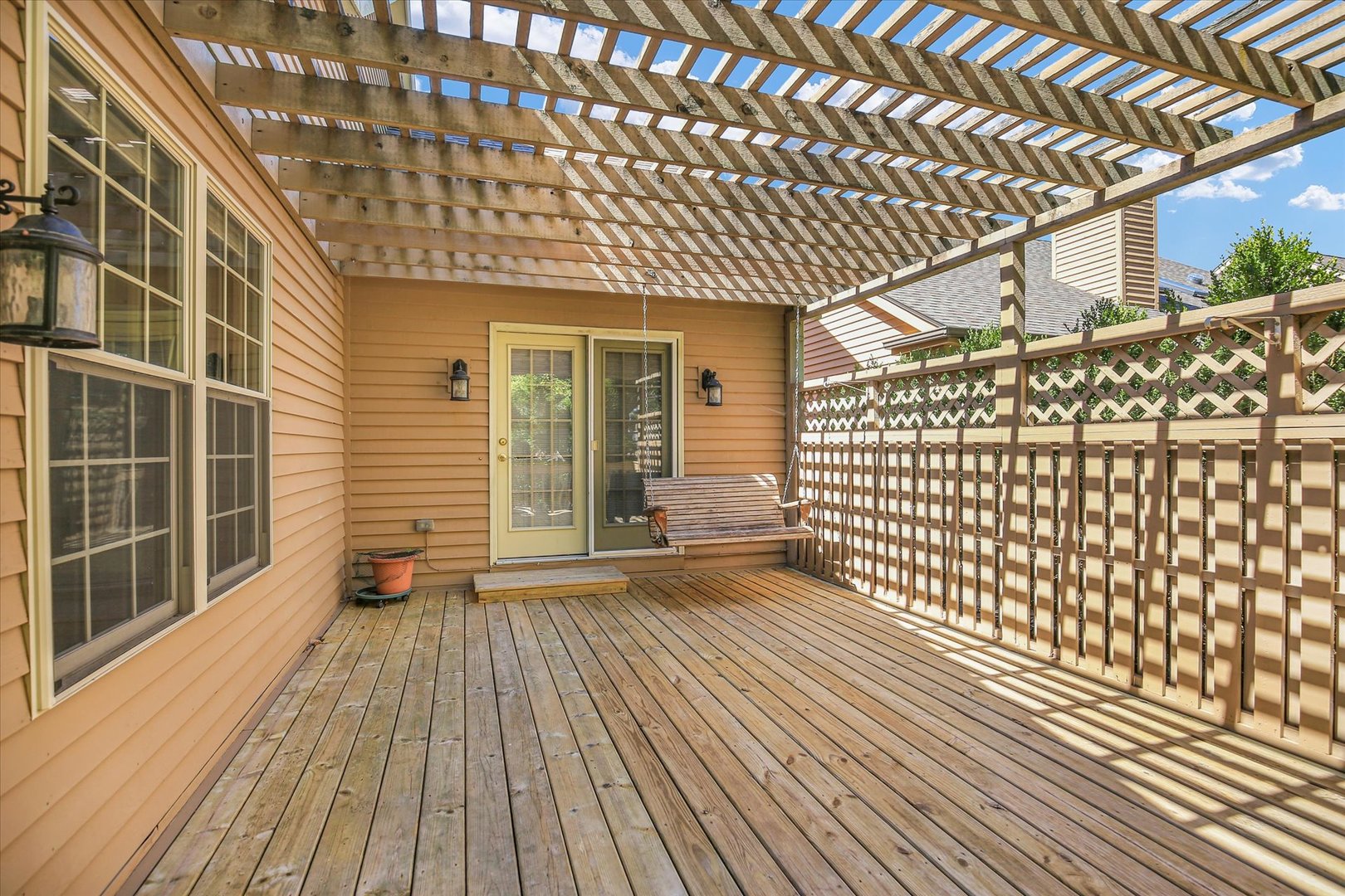 2424 Prairie Ridge Place Champaign, IL 61822 - Photo 42 of 48 a view of a porch with wooden floor