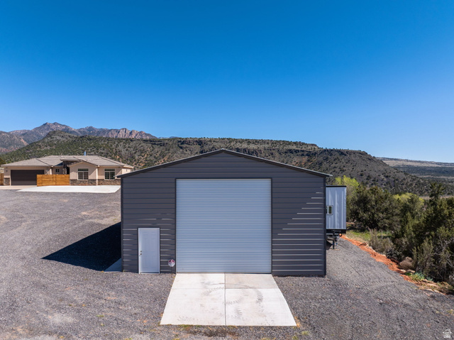 62 North Lucky 7 Road Veyo, UT 84782 - Photo 24 of 43 Detached garage featuring a mountain view