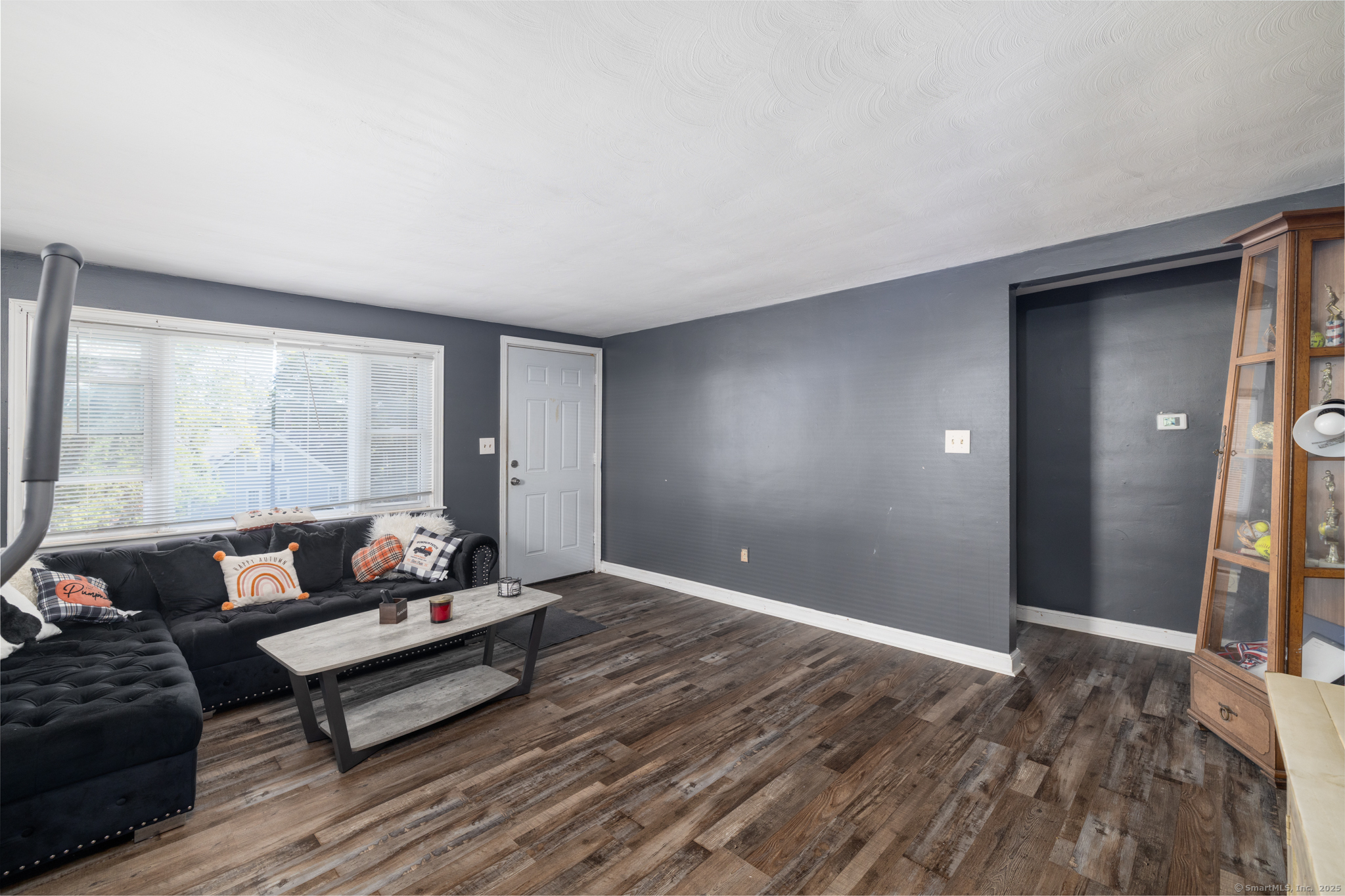 3 Twining Avenue Waterbury, CT 06705 - Photo 4 of 14 a living room with furniture and a window