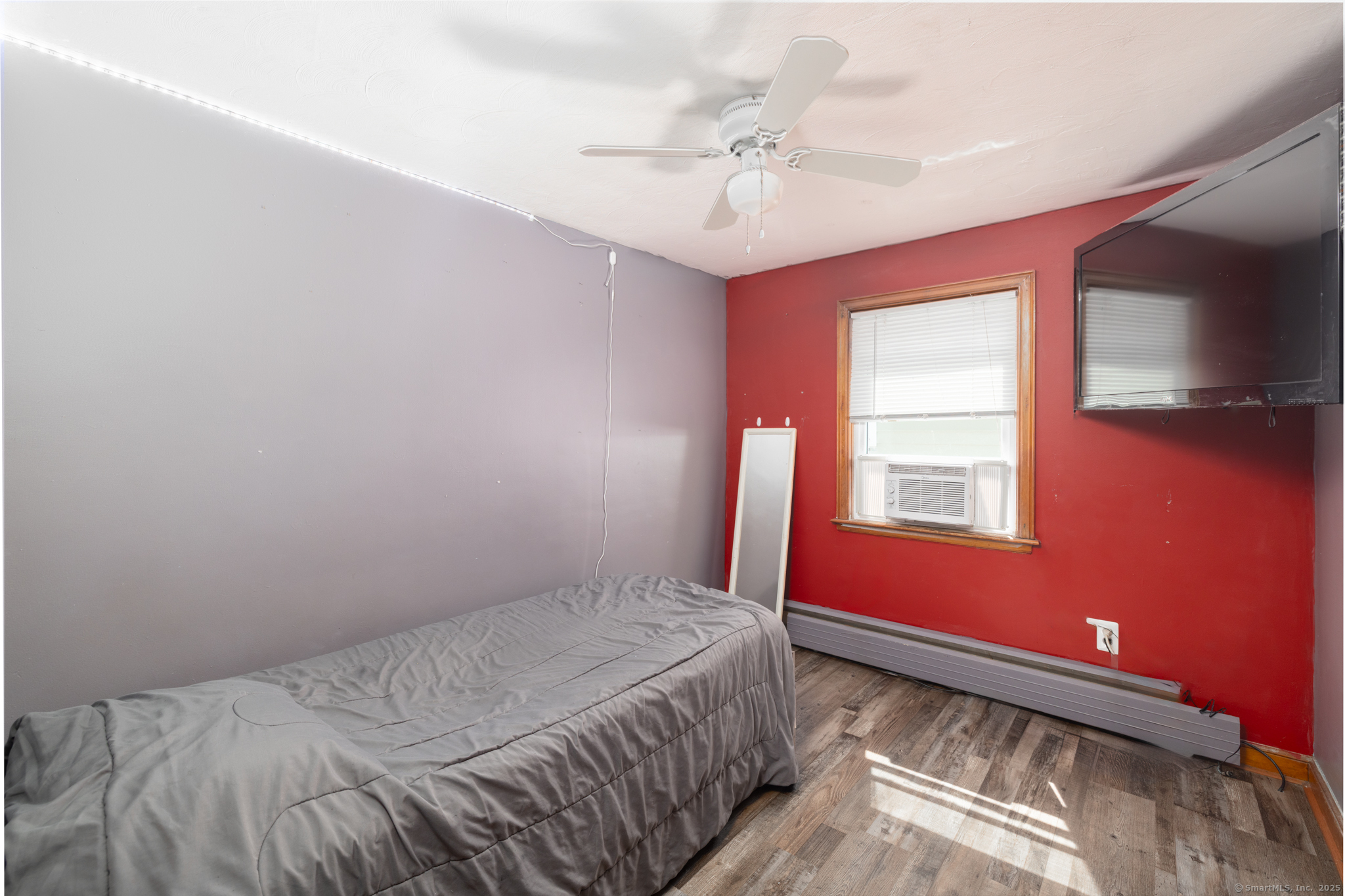 3 Twining Avenue Waterbury, CT 06705 - Photo 6 of 14 a bedroom with a bed and a window