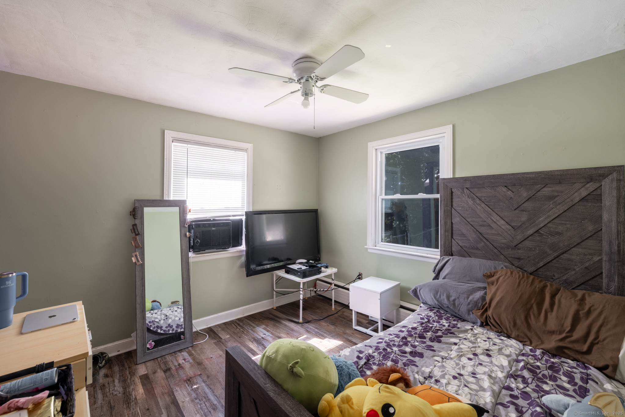 3 Twining Avenue Waterbury, CT 06705 - Photo 7 of 14 a living room with furniture and a flat screen tv