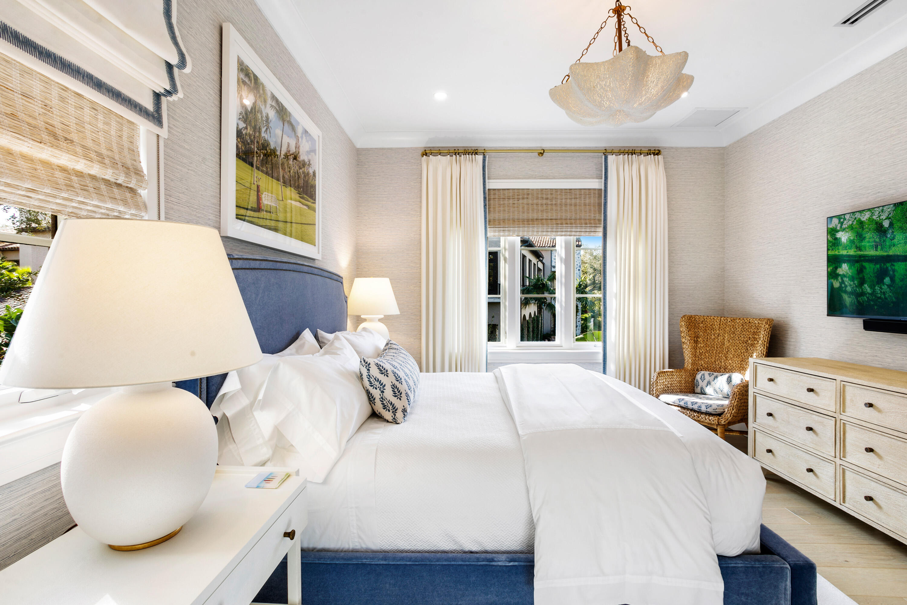 304 Villa Drive Jupiter, FL 33477 - Photo 23 of 43 a bedroom with a bed and a large window