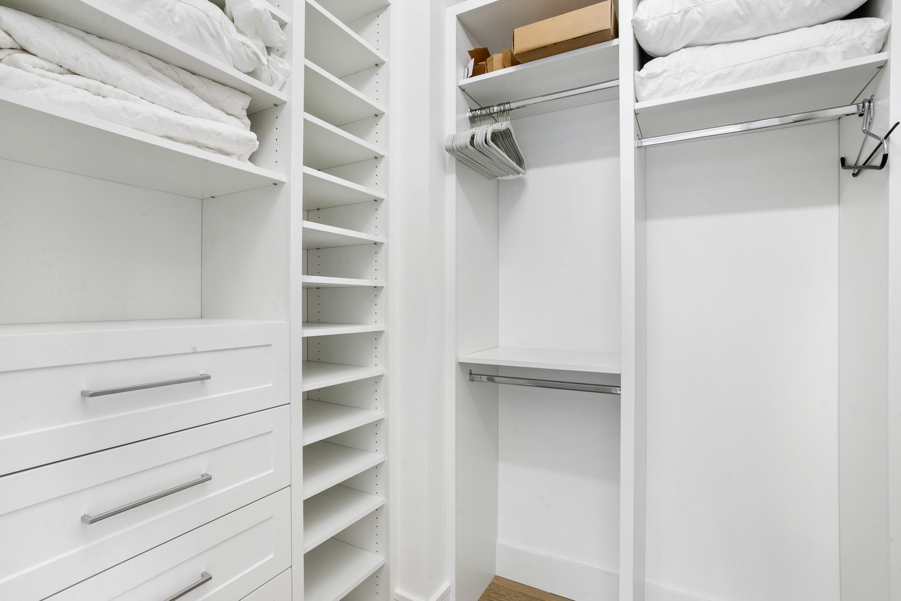 304 Villa Drive Jupiter, FL 33477 - Photo 25 of 43 a view of walk in closet with empty racks