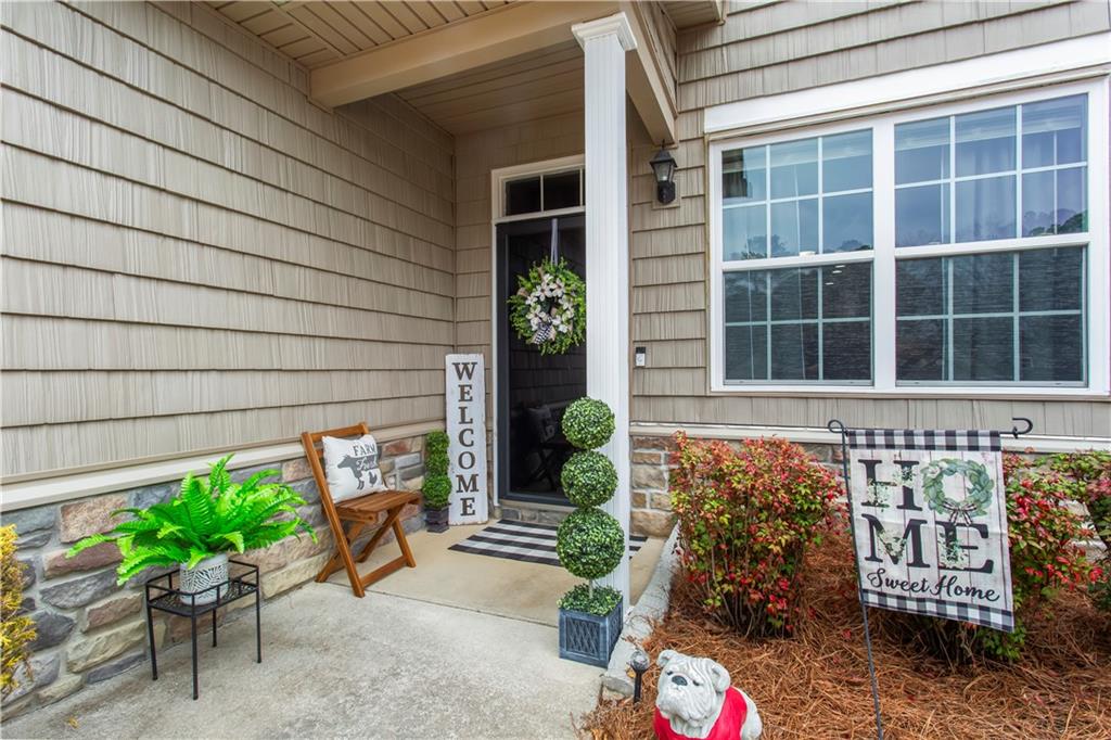 534 Hamilton Way, Unit 3 Chatsworth, GA 30705 - Photo 3 of 22 a front view of a house with a garden