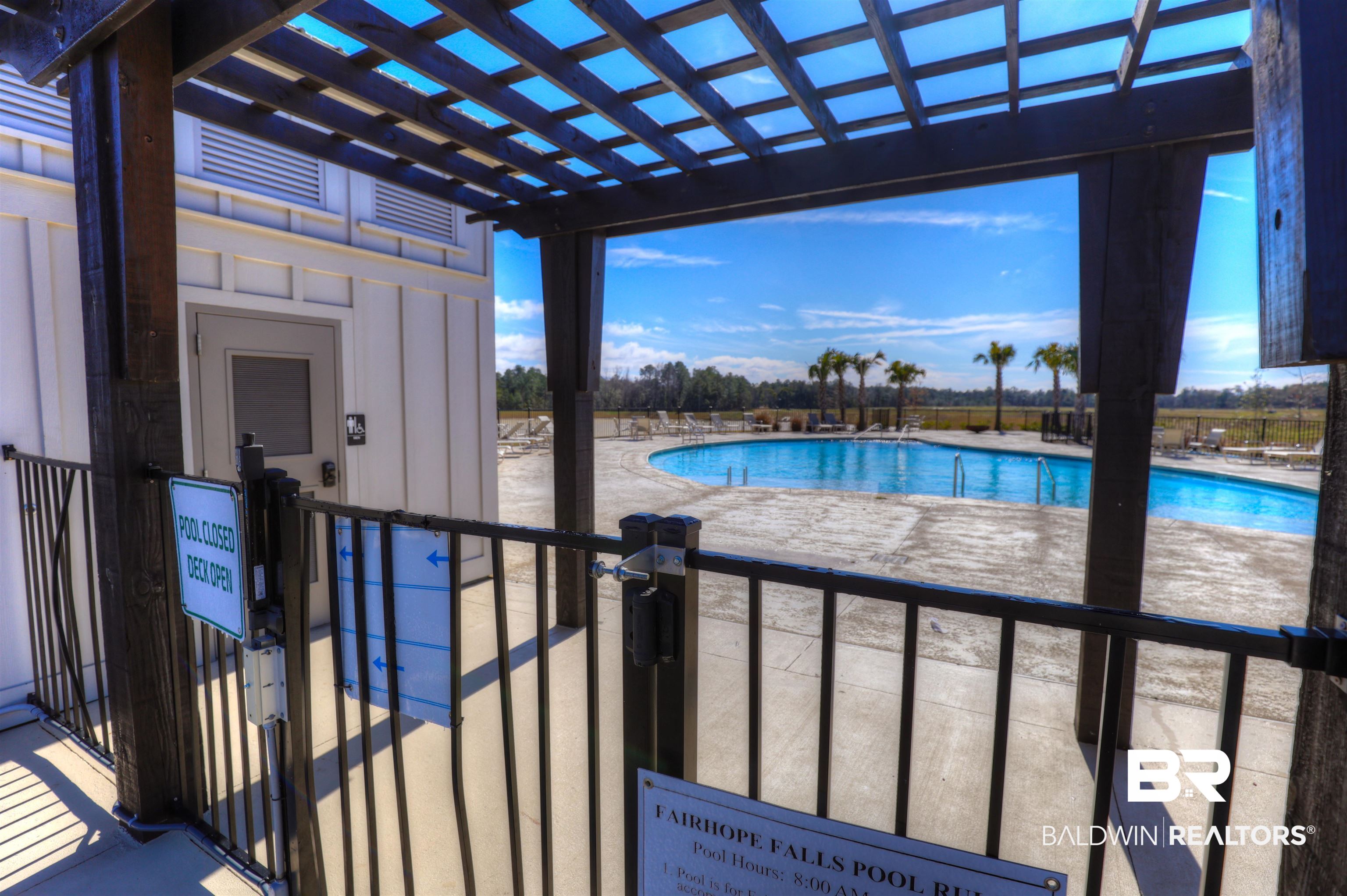 21902 Yosemite Boulevard Fairhope, AL 36532 - Photo 31 of 32 View of pool with a pergola