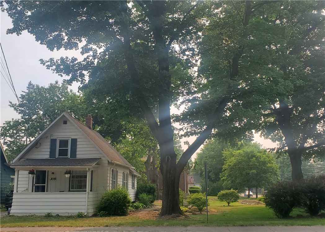 309 Bluff Drive East Rochester, NY 14445 - Photo 1 of 18 309 Bluff Road situated on beautifully landscaped