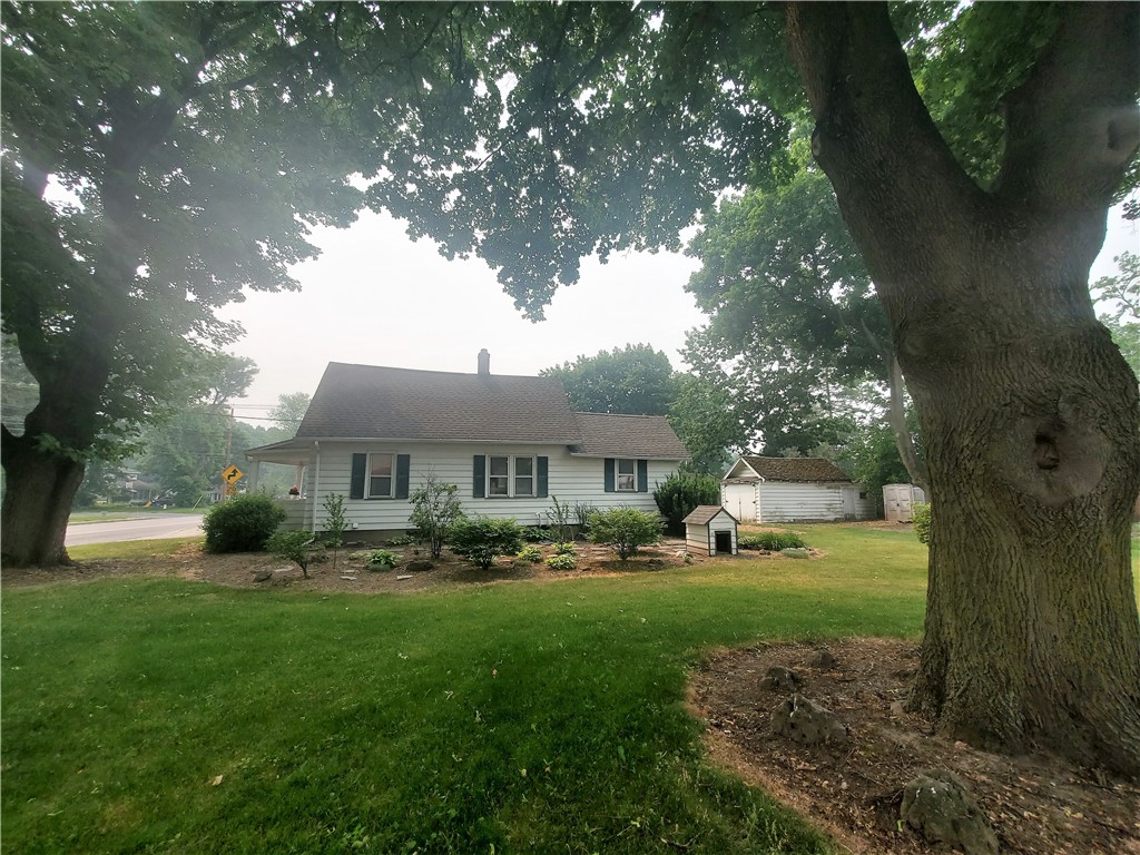 309 Bluff Drive East Rochester, NY 14445 - Photo 15 of 18 Side yard with mature trees and beautiful landscap