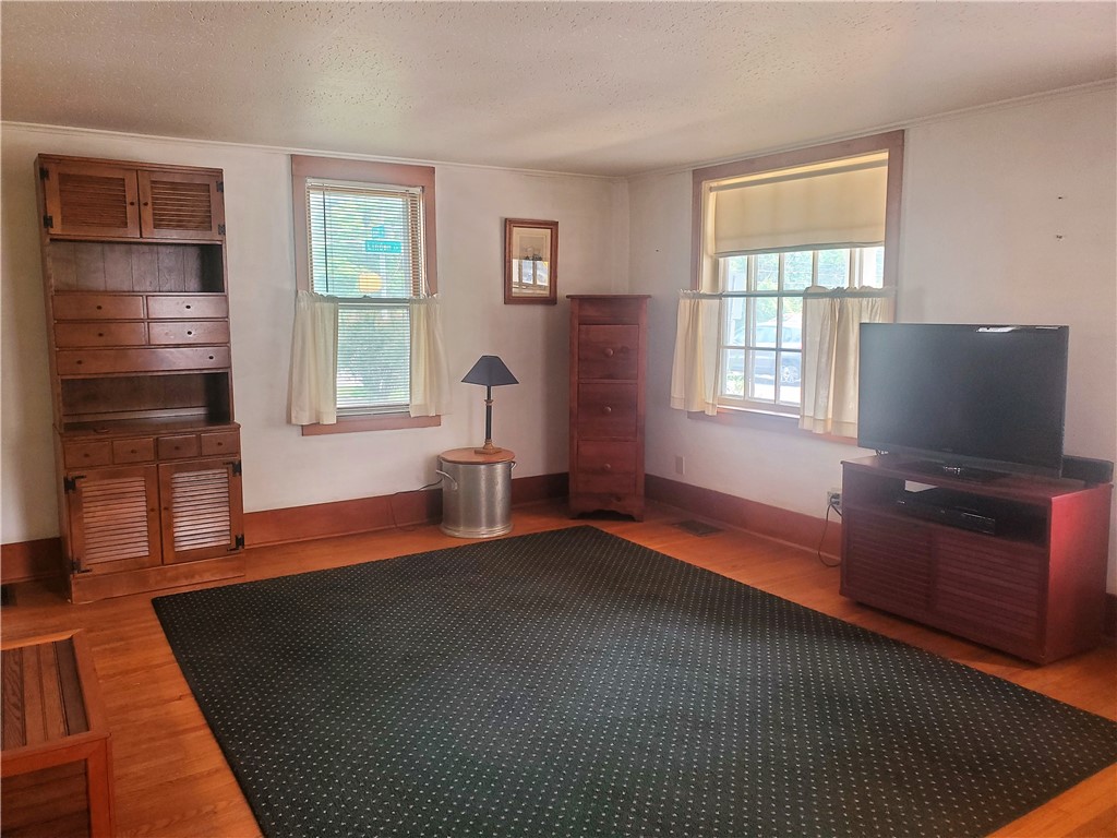 309 Bluff Drive East Rochester, NY 14445 - Photo 3 of 18 Living Room features hardwood floors