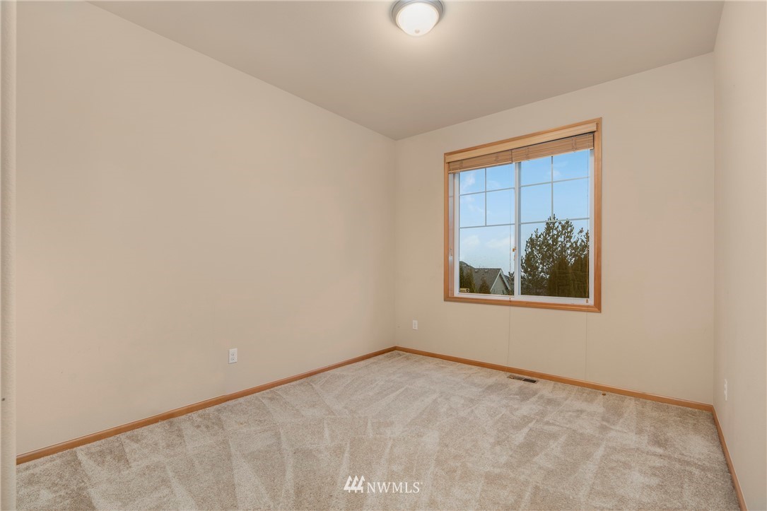 3616 Mill Place South Renton, WA 98055 - Photo 13 of 25 an empty room with a window
